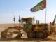 JNF-KKL tractor-bulldozer at work destroying the Palestinian village of Al Araqib