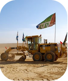 JNF tractor participating in the demolition of Palestinian Bedouin village of Al Araqib