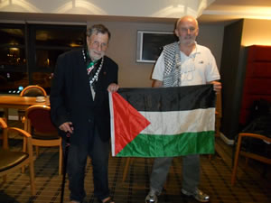 83 year-old John Lynes and SPSC chair Mick Napier, on arrival at Luton Airport last night.