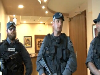 Israeli police blocking participants and audience from entering the Palestine National Theater in E. Jerusalem