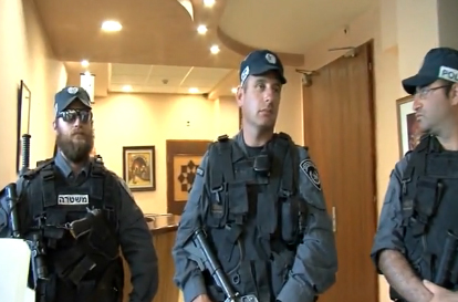 Israeli police blocking participants and audience from entering the Palestine National Theater in E. Jerusalem 