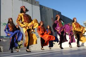 Dancing in Aida Camp under the illegal apartheid Wall