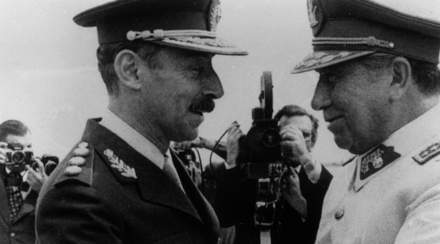 Argentine dictator Jorge Rafael Videla greets fellow South American strongman Augusto Pinochet