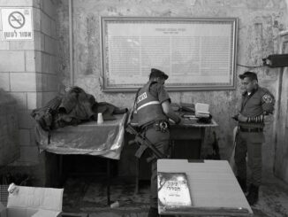 Settler-soldiers pray in area of mosque handed over to settlers after the massacre
